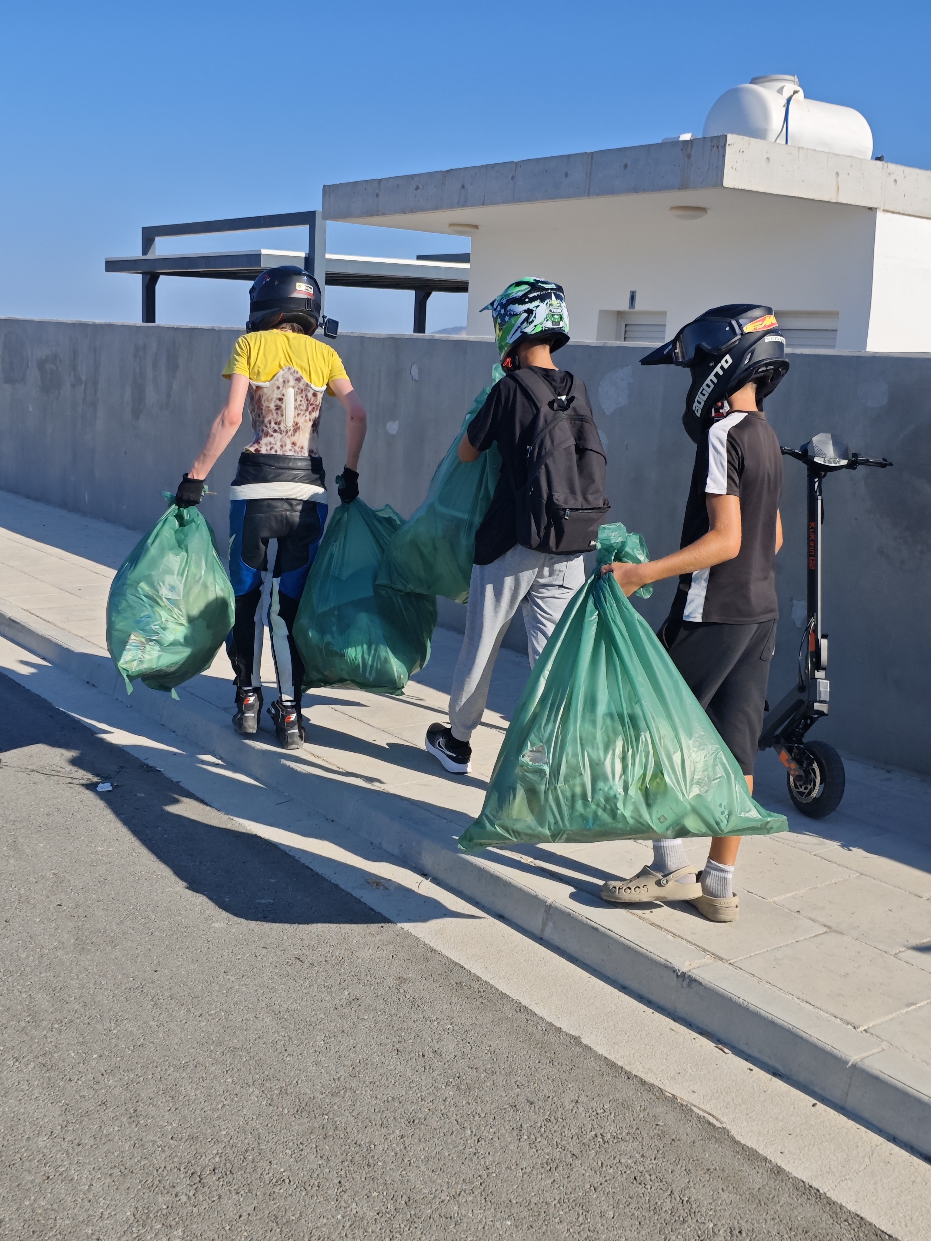 AlexStuntCrew members with collected rubbish