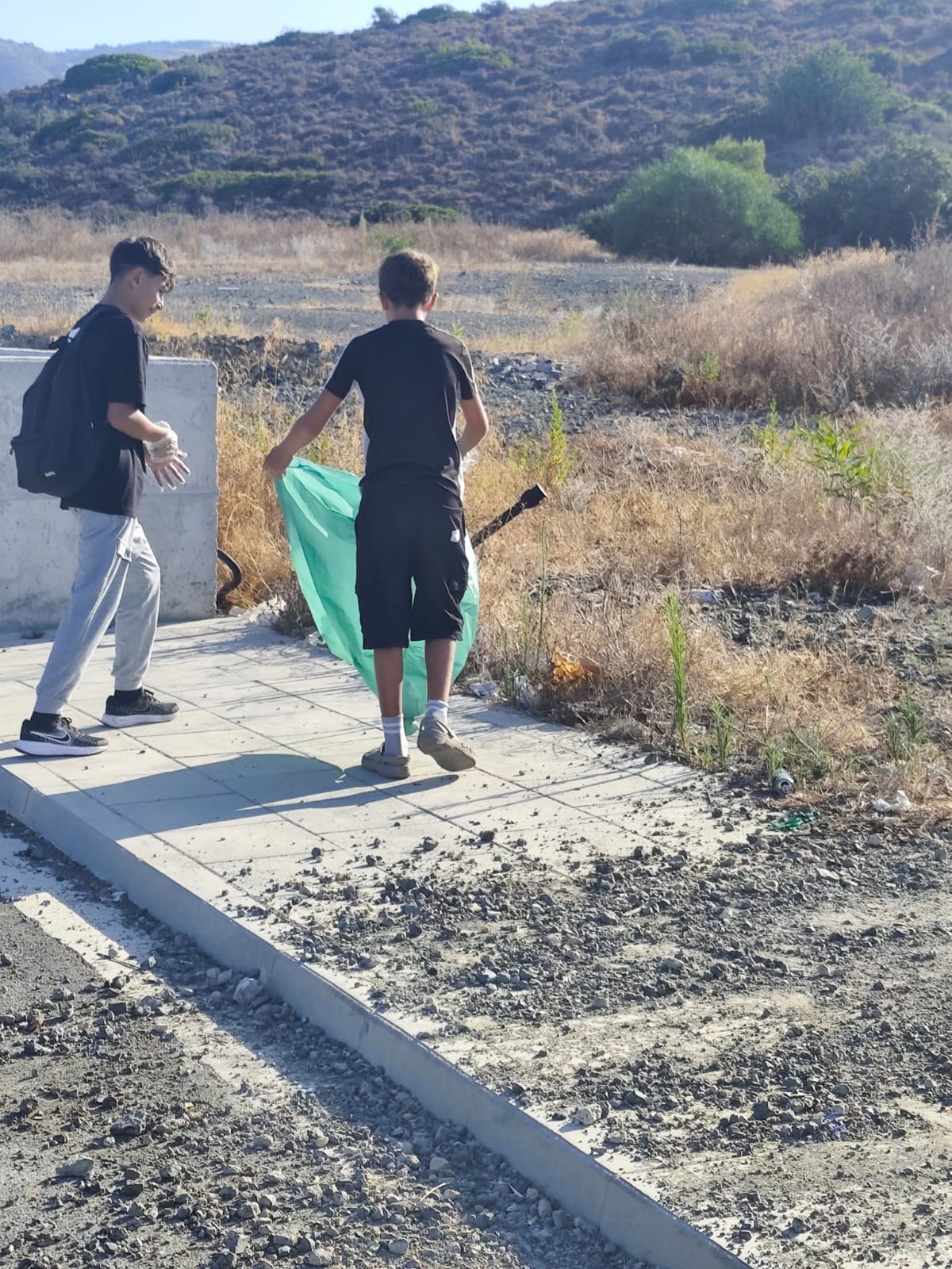 AlexStuntCrew members with collected rubbish