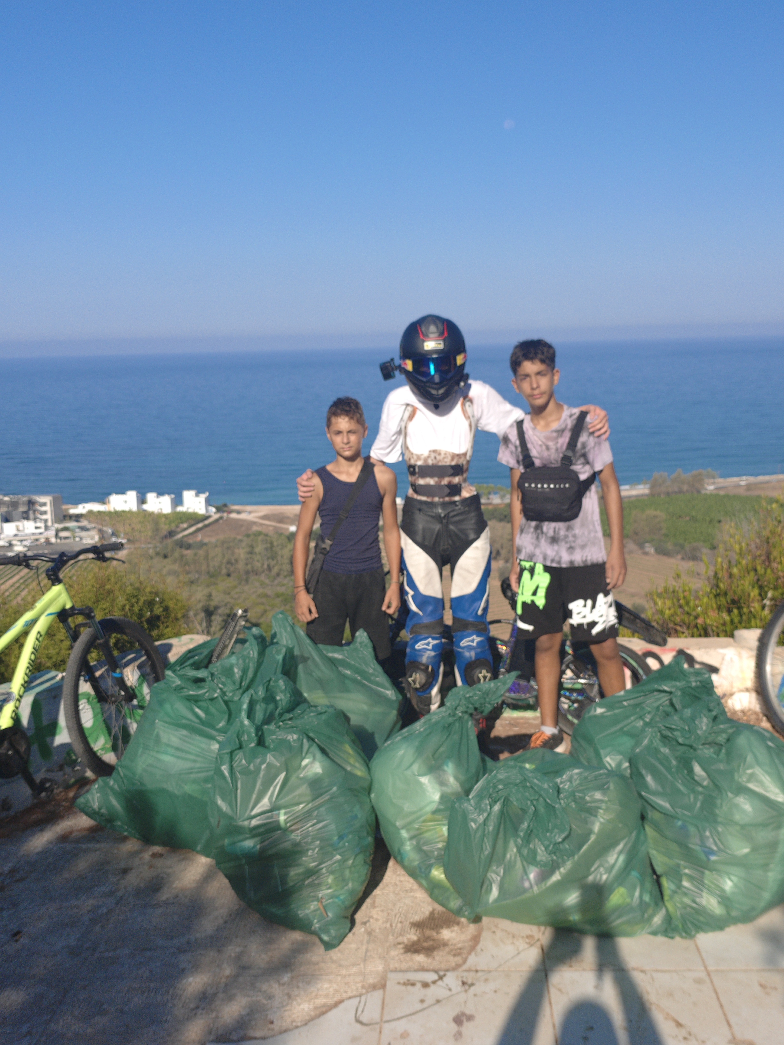 AlexStuntCrew members with collected rubbish